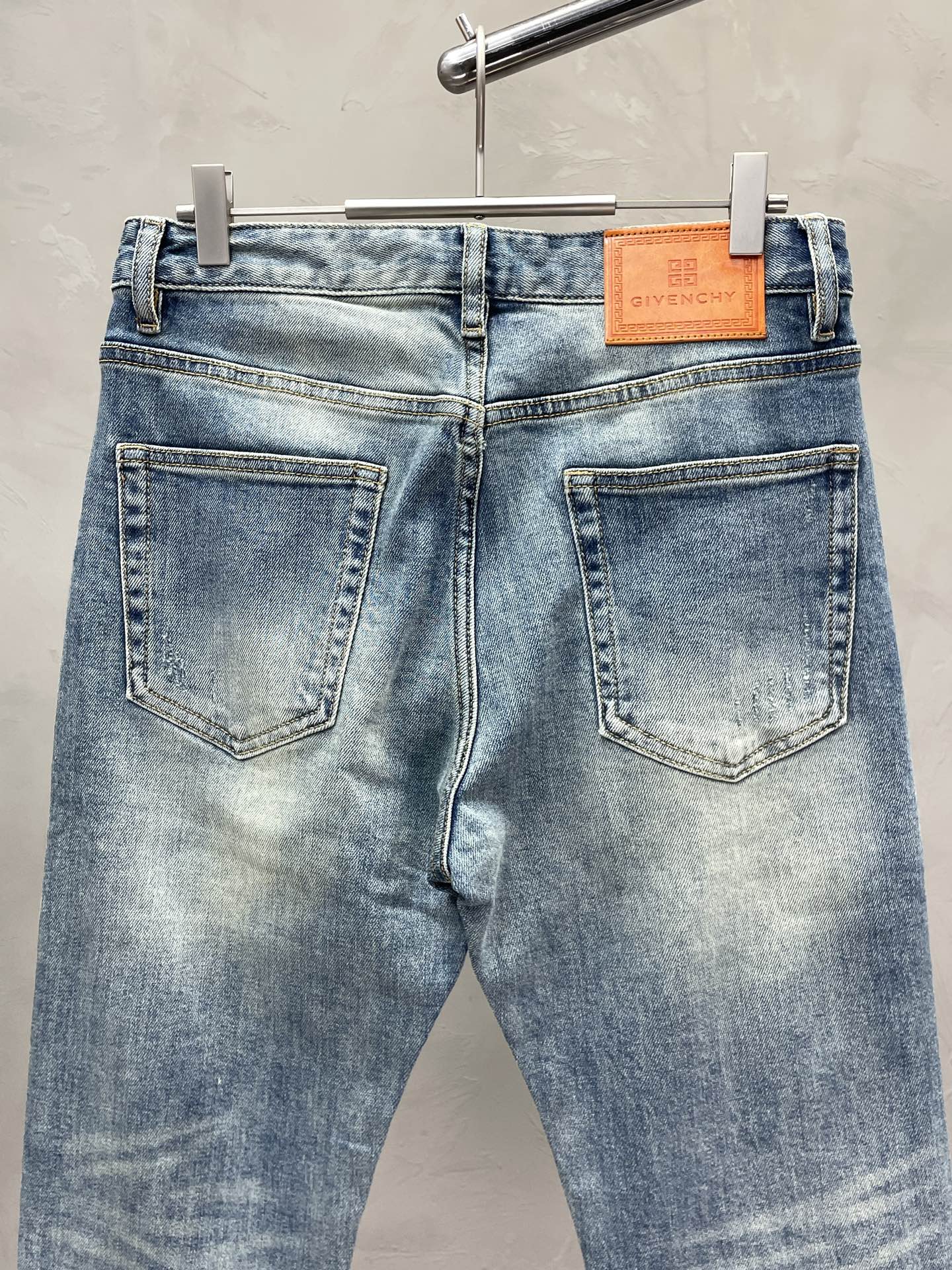 Givenchy Light Blue Distressed Patchwork Denim Jeans For Fashion - Forward Style