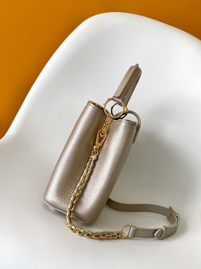 Elegant Louis Vuitton Capucines Mini Bag in Beige Grained Leather with Gold Accents