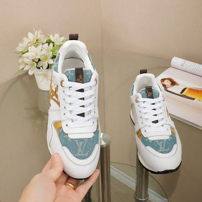 Louis Vuitton Women's White Sneakers With Blue Patterns And Gold Accents