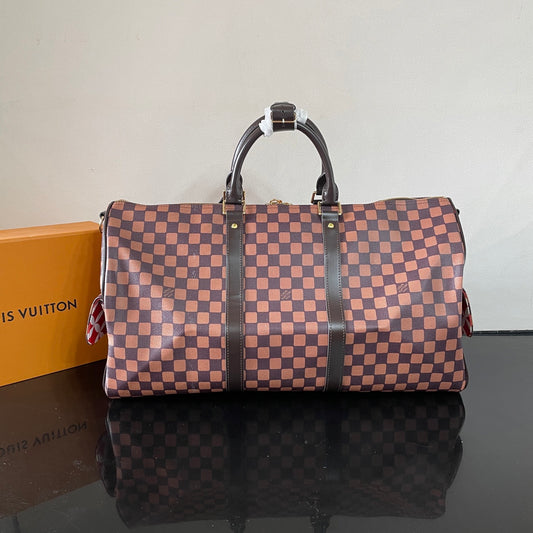 Louis Vuitton Damier Pattern Travel Bag With Unique Graphic Design For Fashion Trips