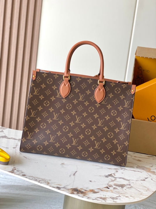 Elegant Louis Vuitton Monogram Canvas Handbag With Leather Accents For Sophisticated Style