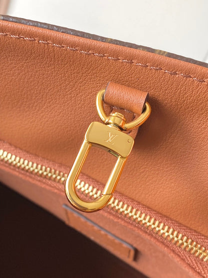 Elegant Louis Vuitton Monogram Canvas Handbag With Leather Accents For Sophisticated Style