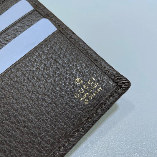 Gucci Wallet With Disney Donald Duck Print And GG Pattern For Fashion Enthusiasts 647937