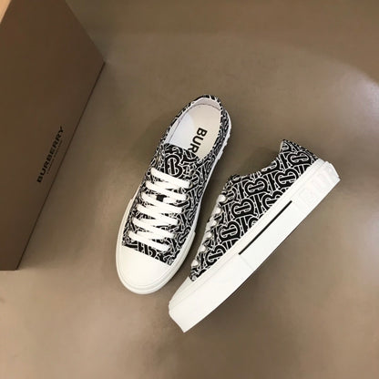 Burberry Unisex Black White Monogram Canvas Sneakers Fashionable Versatile Footwear For Men And Women With Signature Logo Design