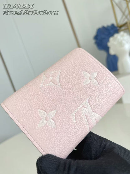 Chic Louis Vuitton Pink Leather Wallet With Embossed Monogram And Gold Accent M14229