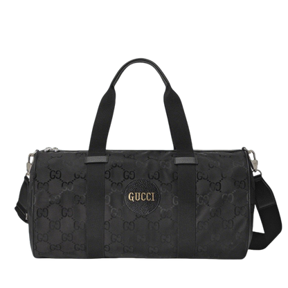 Elegant Black Gucci Duffle Bag With Signature GG Pattern And Gold Branding 658632