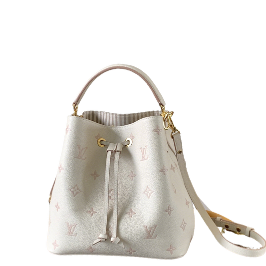 Chic Louis Vuitton White Monogram Empreinte Bucket Bag for Fashion - Forward Style