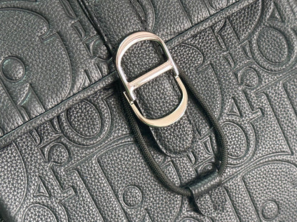 Elegant Dior Daily Black Leather Backpack With Embossed Monogram And Buckle Closure BA231
