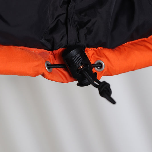 The North Face 1996 Retro Nuptse Orange Puffer Jacket for Cold Weather