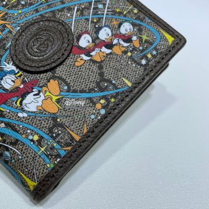Gucci Wallet With Disney Donald Duck Print And GG Pattern For Fashion Enthusiasts 647937