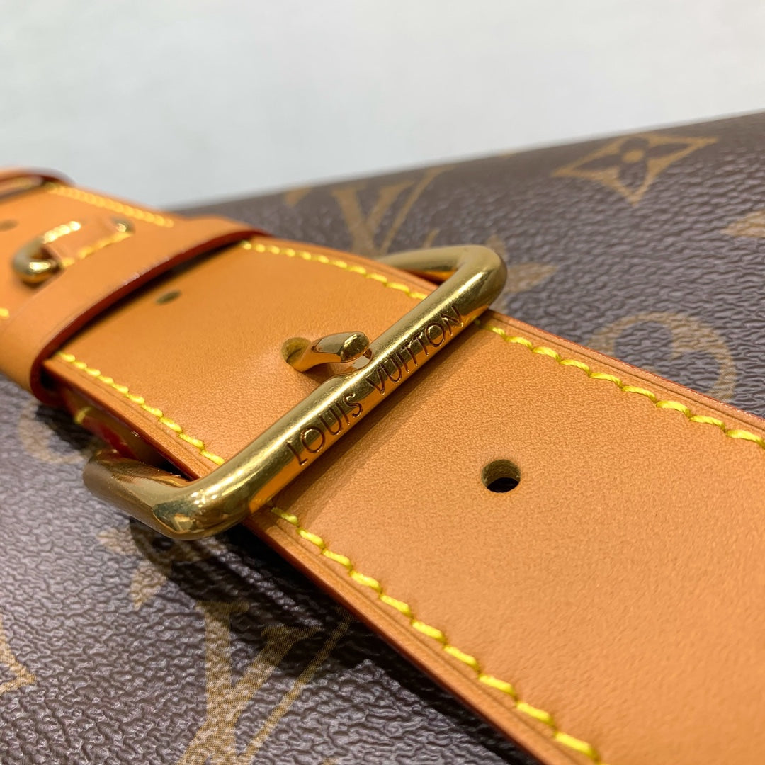 Classic Louis Vuitton Monogram Messenger Bag With Tan Leather Accents And Buckles
