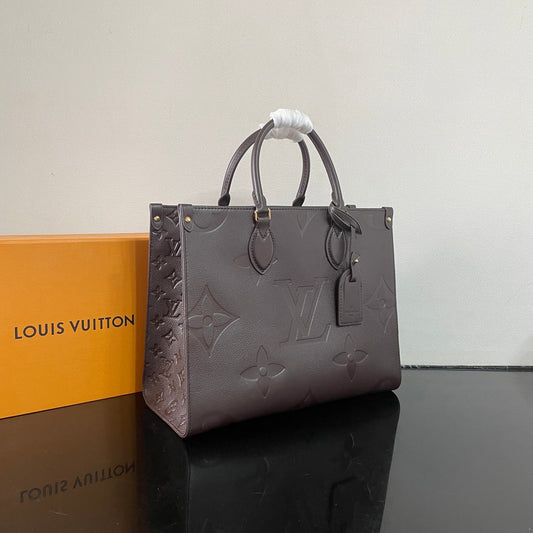 Elegant Louis Vuitton Gray Embossed Leather Tote Bag With Signature Monogram Patterns