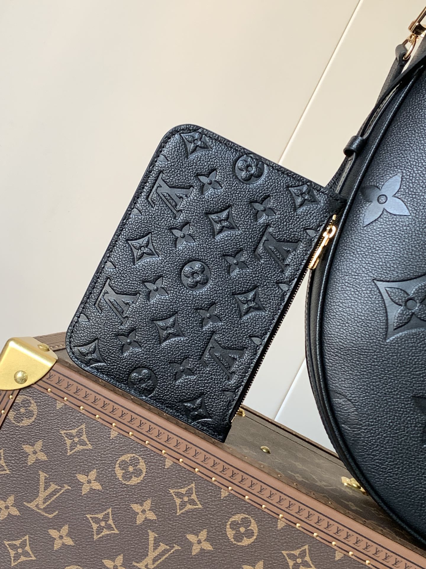 Louis Vuitton Black Embossed Leather Moon Bag With Gold Chain Stylish Luxury Shoulder Accessory
