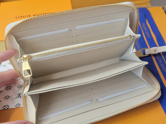 Elegant Louis Vuitton White Leather Wallet With Pink Monogram Embossing For Sophisticated Style M13644
