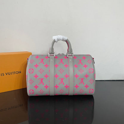 Stylish Louis Vuitton Keepall Bandoulière 35 Bag In Gray With Pink Monogram For Travel And Fashion