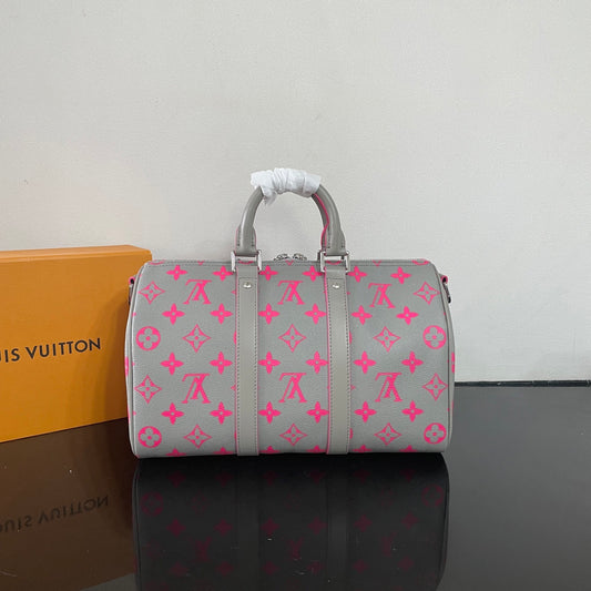 Stylish Louis Vuitton Keepall Bandoulière 35 Bag In Gray With Pink Monogram For Travel And Fashion