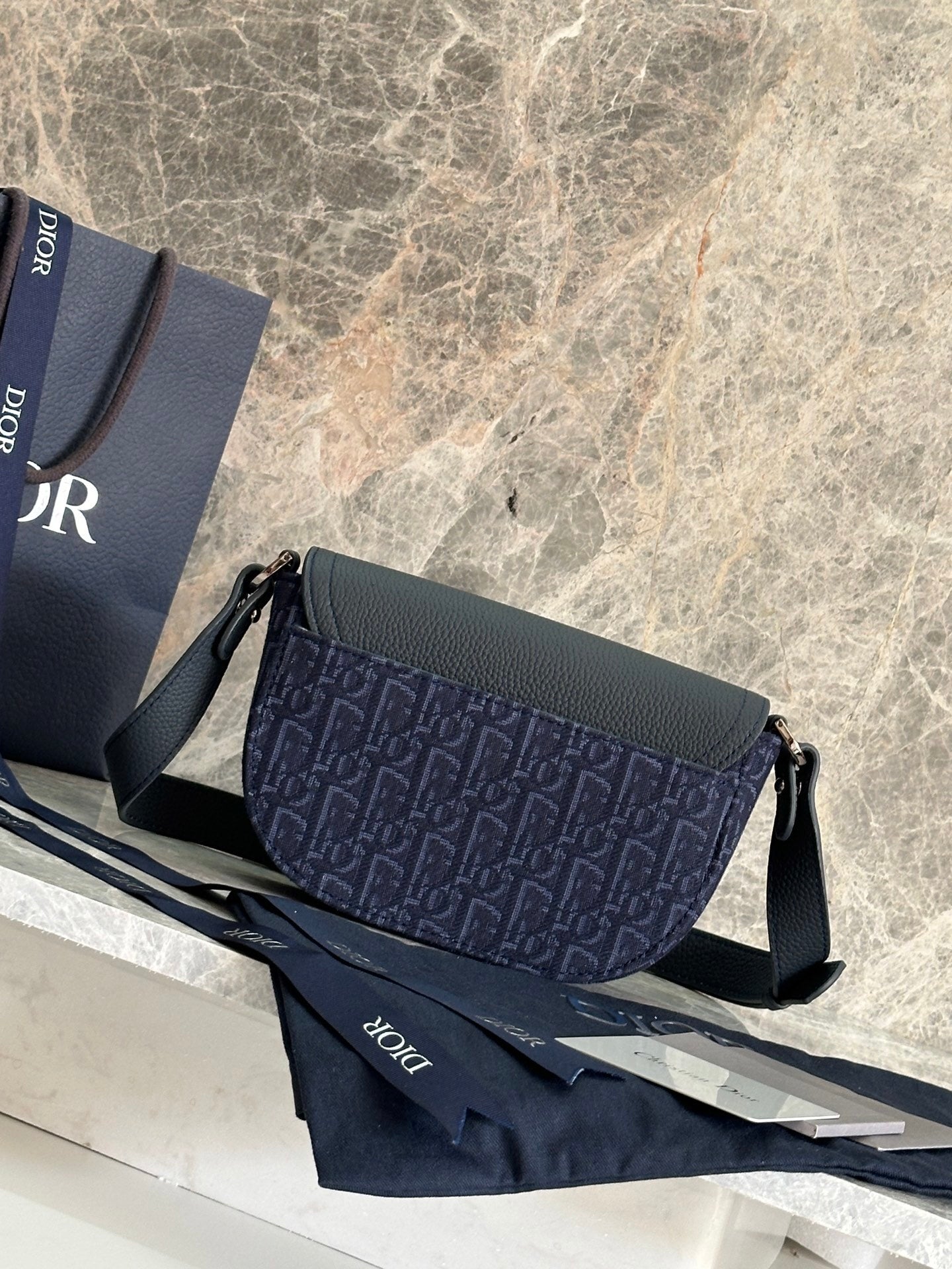 Stylish Dior Saddle Bag With Signature Monogram And Leather Accents CA435