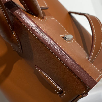 Timeless Hermès Birkin Bag in Classic Brown Leather with Silver Hardware 169