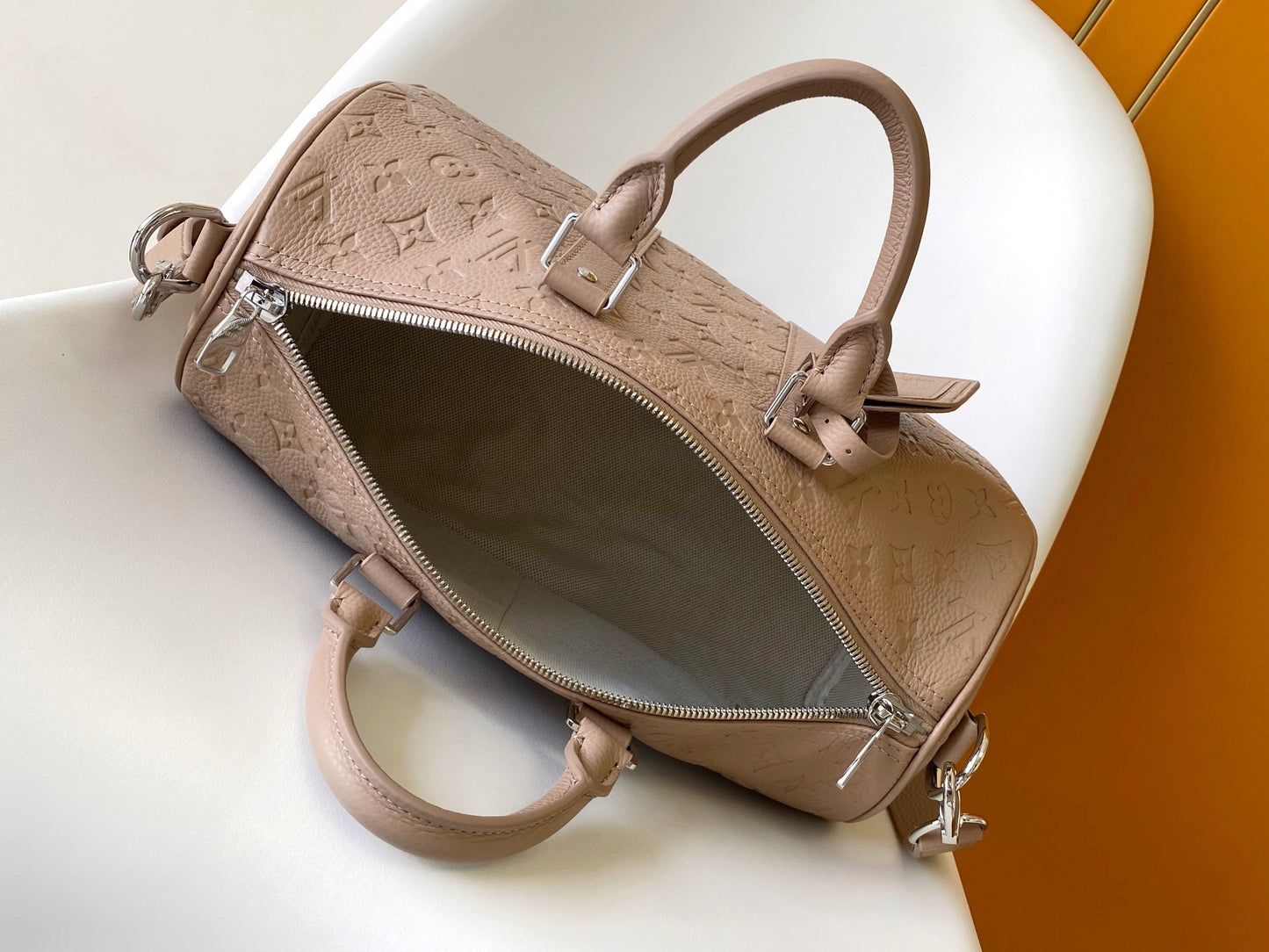 Louis Vuitton Embossed Leather Keepall Bandoulière Bag in Beige for Luxury Travel and Style