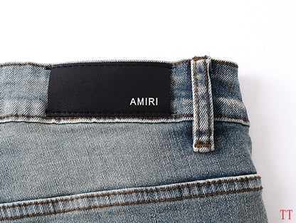 Amiri Light Blue Distressed Denim Shorts With Artful Rips