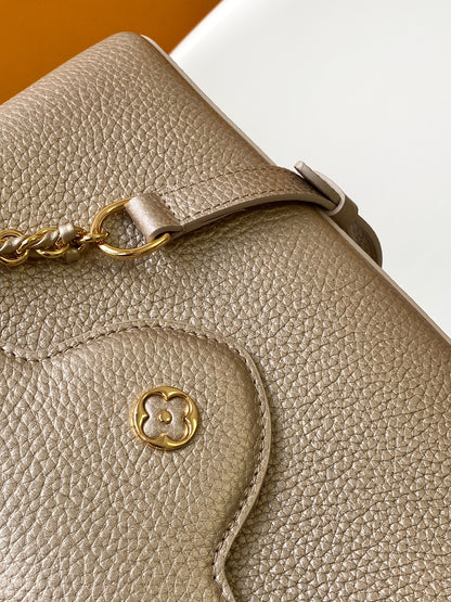 Elegant Louis Vuitton Capucines Mini Bag in Beige Grained Leather with Gold Accents