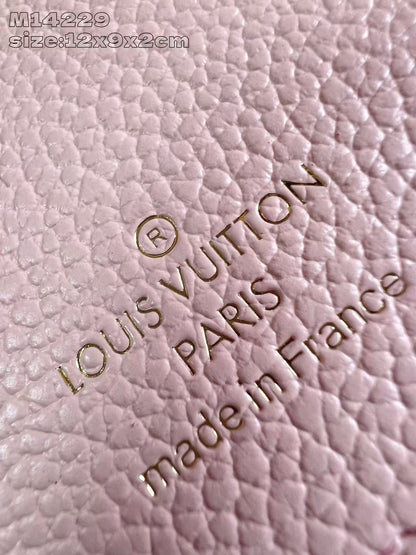 Chic Louis Vuitton Pink Leather Wallet With Embossed Monogram And Gold Accent M14229