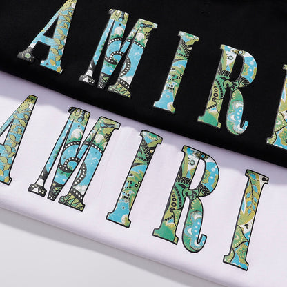 AMIRI White/Black Tee With Colorful Camo Logo For Stylish Streetwear Looks