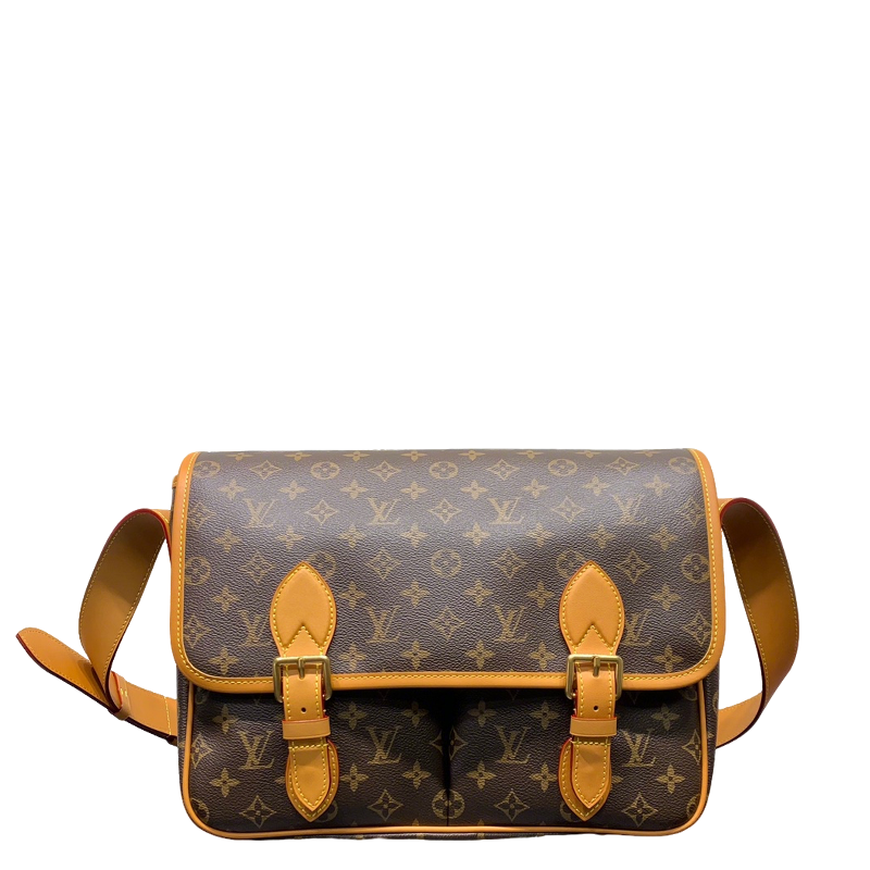 Classic Louis Vuitton Monogram Messenger Bag With Tan Leather Accents And Buckles
