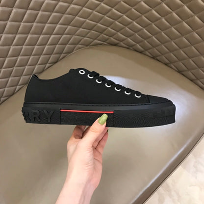 Burberry Unisex Black Canvas Sneakers Stylish Comfortable Footwear For Men And Women With Red Accent Detail