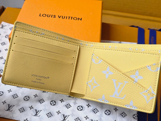 Elegant Louis Vuitton Light Blue Wallet With Gold Monogram And Sparkling Accents M14694