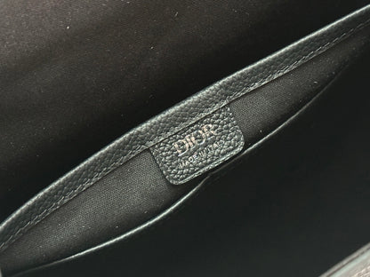 Elegant Dior Daily Black Leather Backpack With Embossed Monogram And Buckle Closure BA231