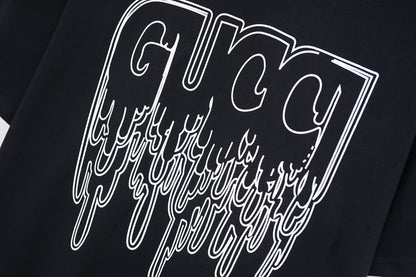 Gucci Cream/Black Tee With Dripping Logo Design For Edgy Fashion Aficionados