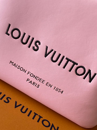 Elegant Pink Louis Vuitton Tote Bag With Contrast Color Handles And Branding