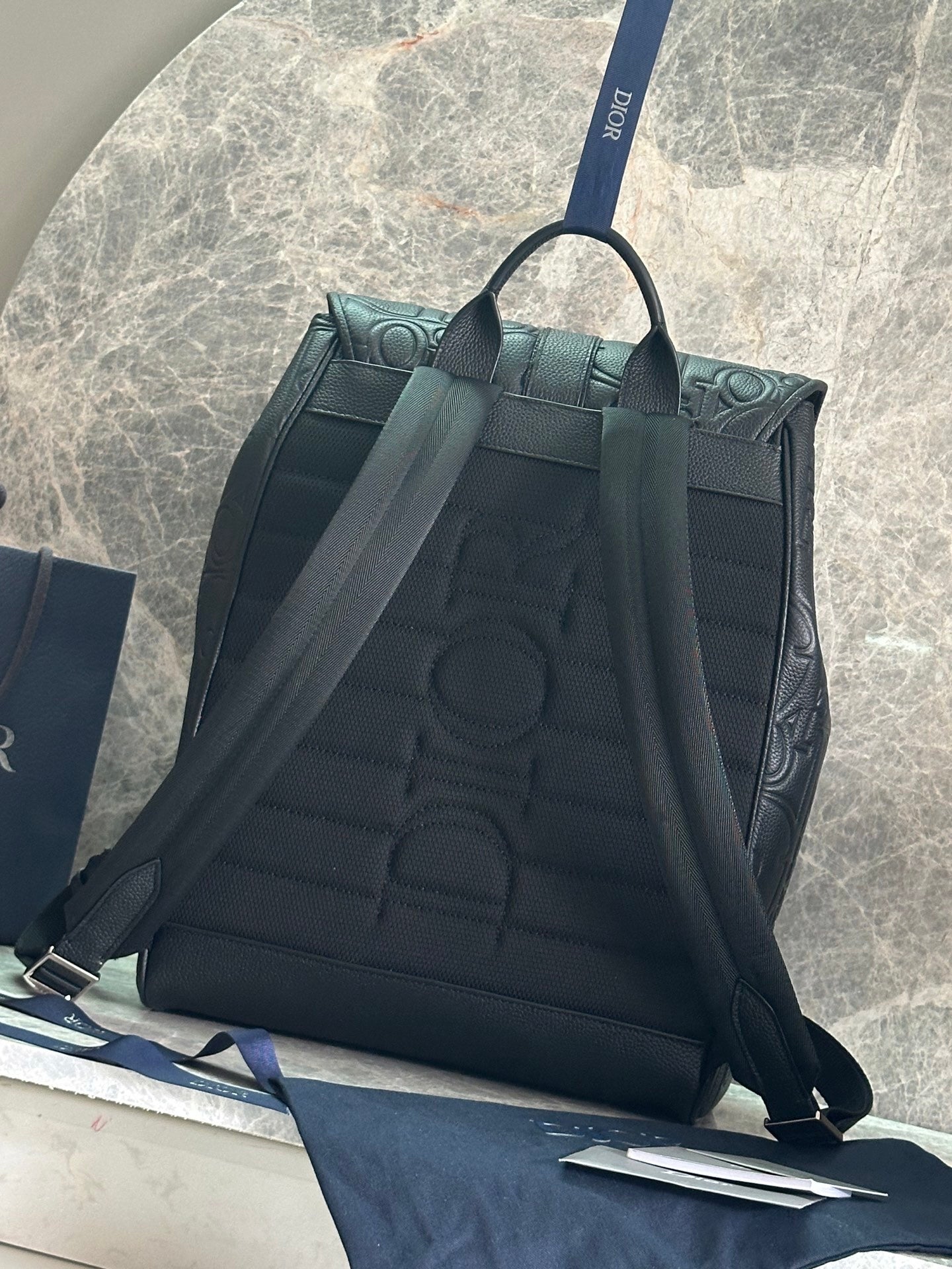 Elegant Dior Daily Black Leather Backpack With Embossed Monogram And Buckle Closure BA231