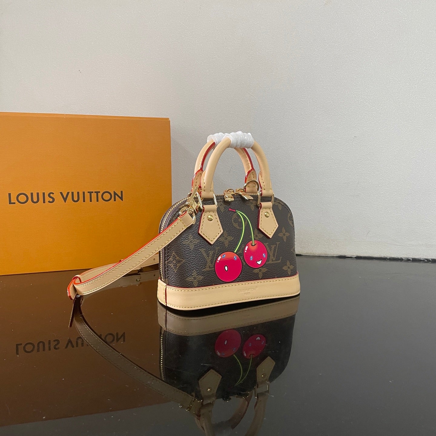 Adorable Louis Vuitton Alma BB Bag With Cherry Motif For Fashion Enthusiasts