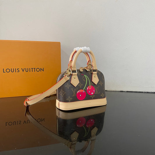 Adorable Louis Vuitton Alma BB Bag With Cherry Motif For Fashion Enthusiasts