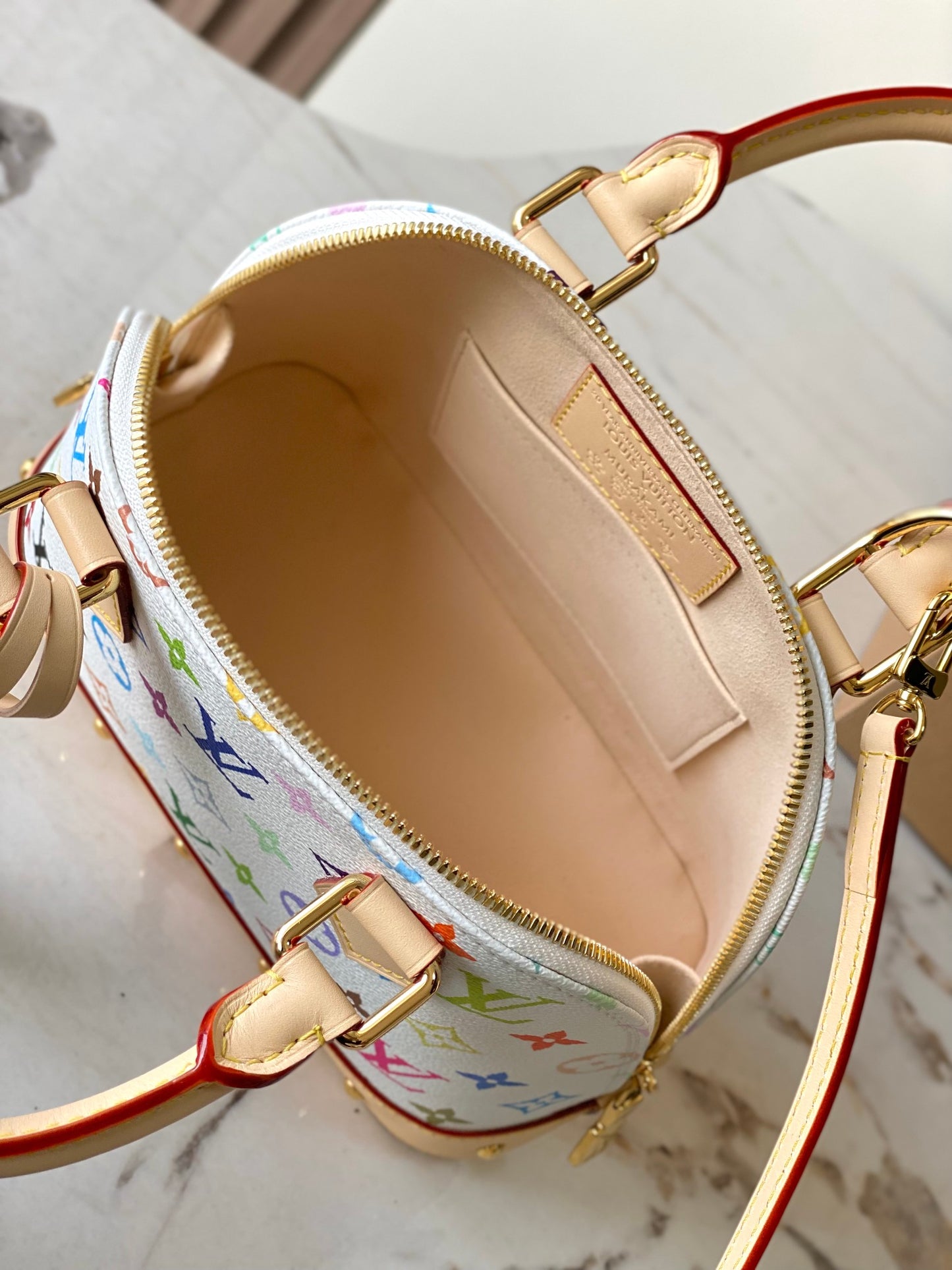 Eye Catching Louis Vuitton Alma BB Bag With Colorful Monogram And Bow Accent