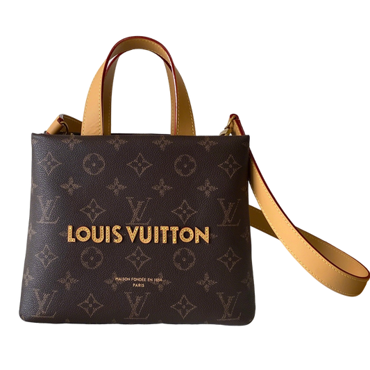 Elegant Louis Vuitton Monogram Canvas Tote Bag With Leather Handles And Gold Branding