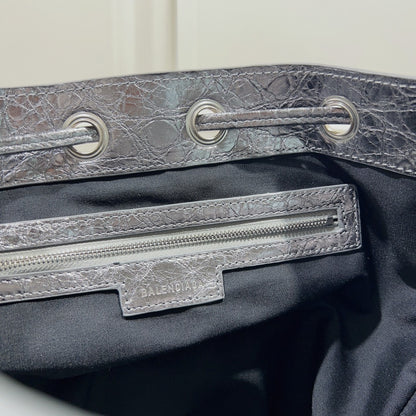 Metallic Balenciaga Bucket Bag with Studs and Adjustable Straps for Edgy Fashion Style No.3033