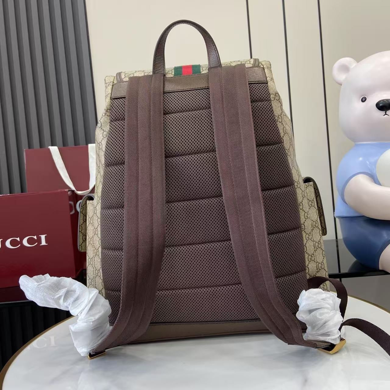 Classic Gucci Backpack With Iconic GG Pattern Web Stripe And Gold Accents For Timeless Style 839110
