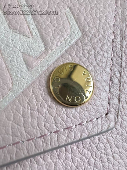 Chic Louis Vuitton Pink Leather Wallet With Embossed Monogram And Gold Accent M14229