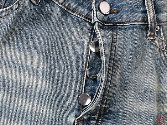 Amiri Light Blue Distressed Denim Shorts With Artful Rips