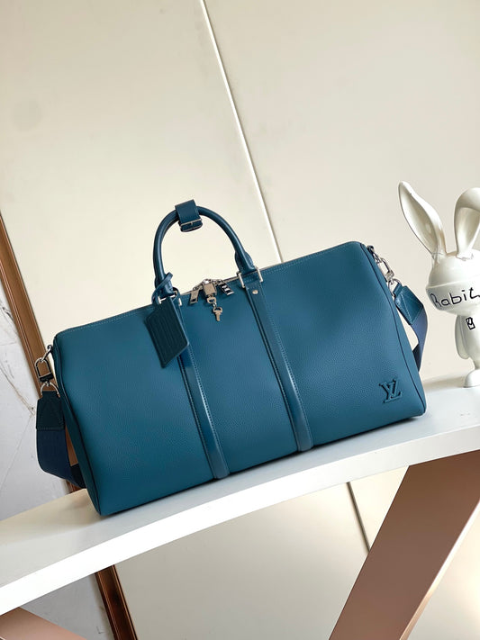 Louis Vuitton Blue Leather Keepall Travel Bag Stylish Durable Weekend Duffle for Luxury Trips