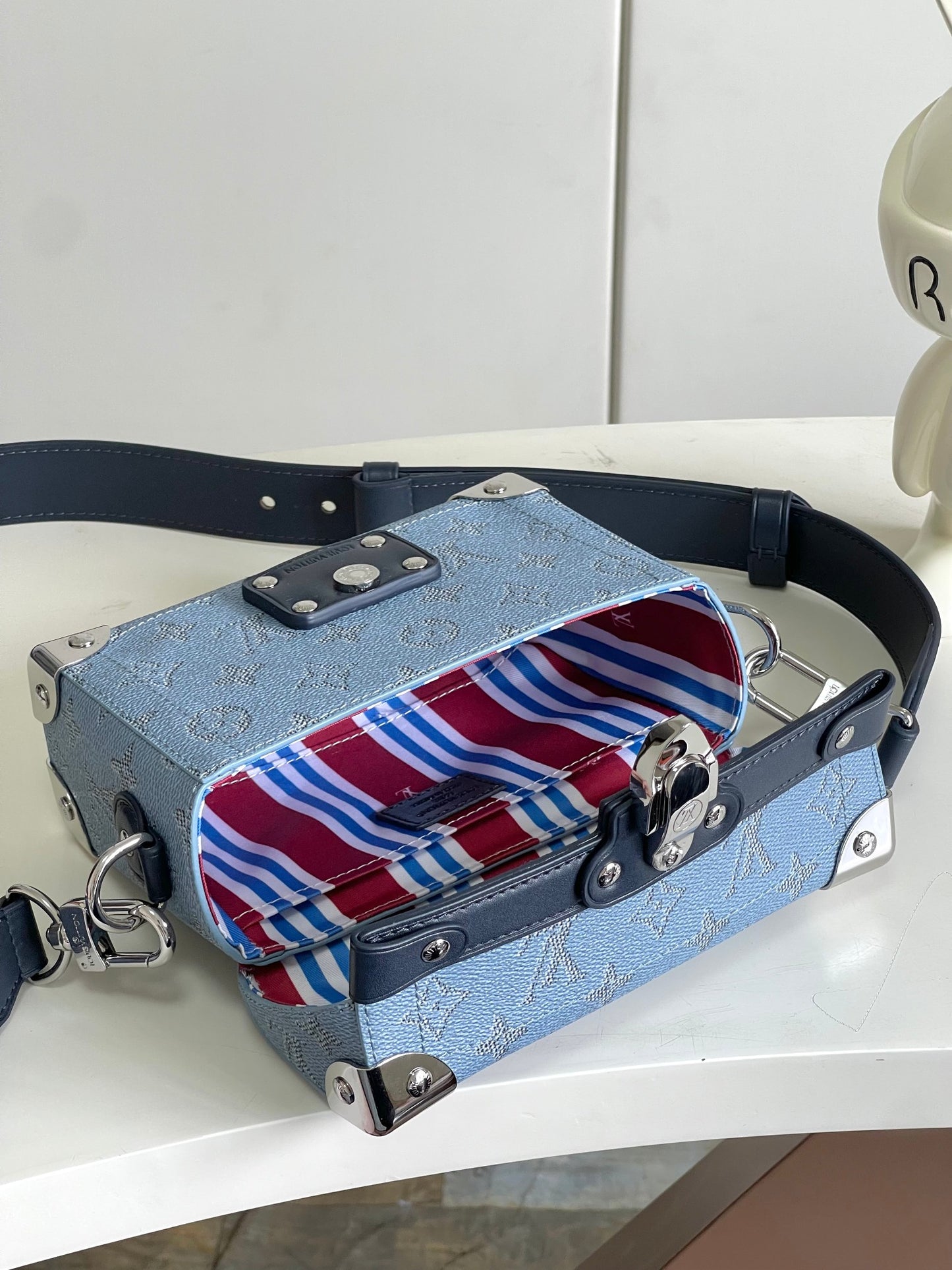 Chic Louis Vuitton Blue Monogram Trunk Bag With Navy Accents And Silver Hardware