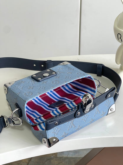 Chic Louis Vuitton Blue Monogram Trunk Bag With Navy Accents And Silver Hardware
