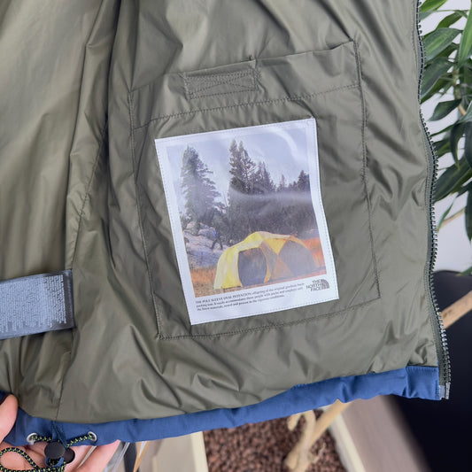 The North Face Nuptse Puffer Jacket In Blue And Olive Color Block Design