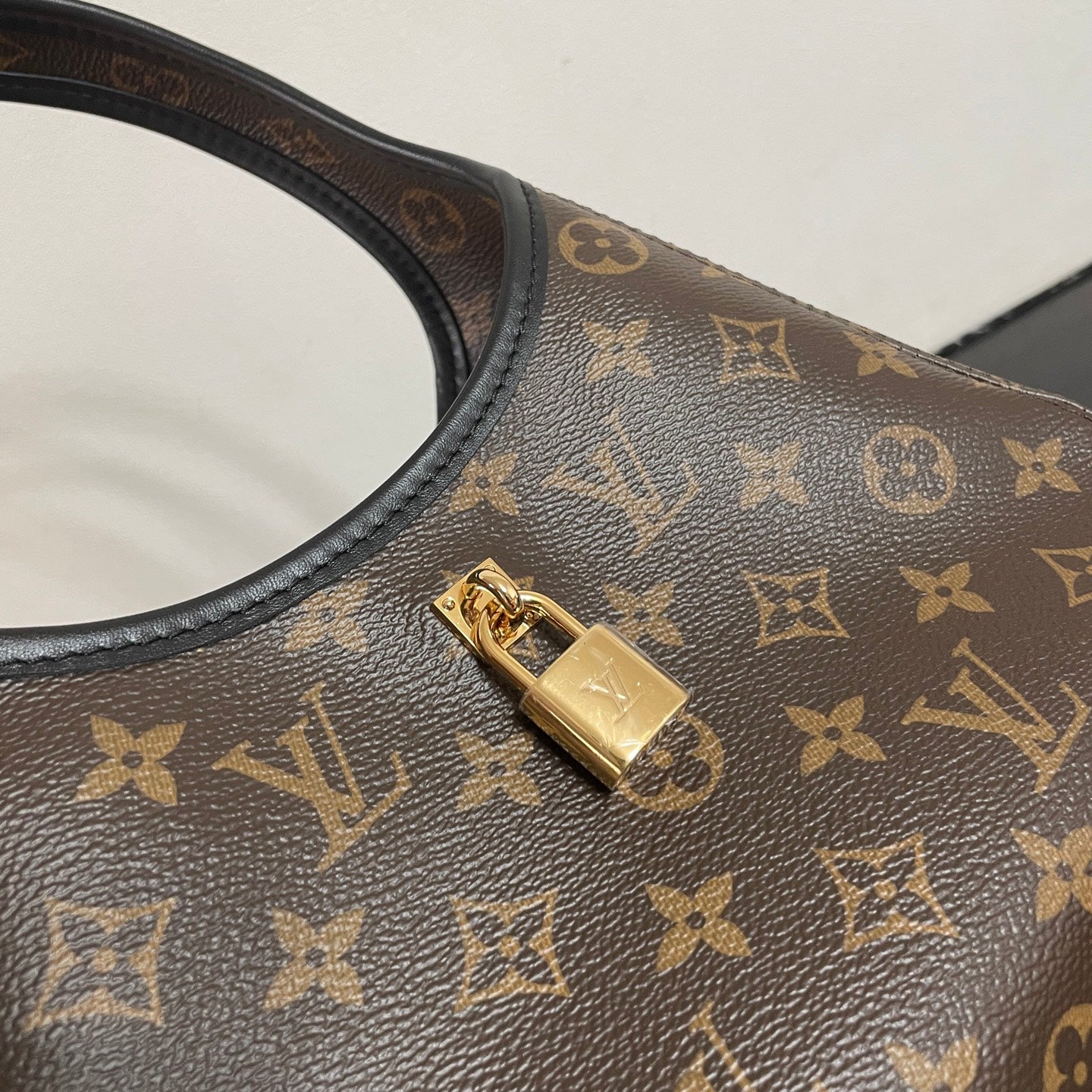 Louis Vuitton Monogram Canvas Hobo Bag With Lock Detail And Stylish Design For Fashion Fans