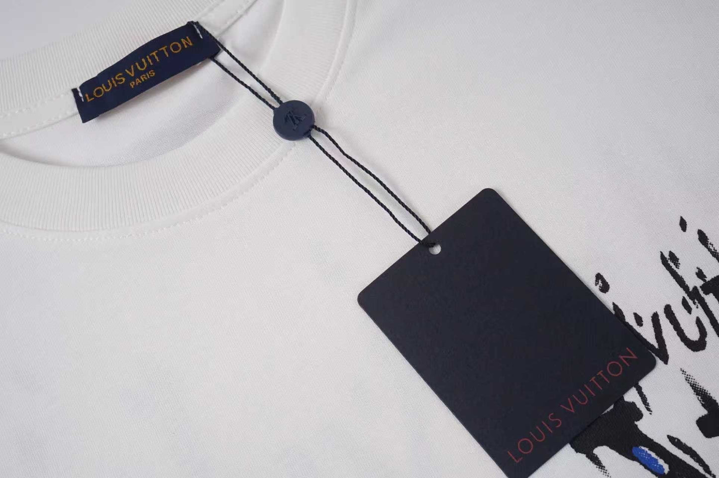 Louis Vuitton Black/White T shirt with Artistic Paint Splatter and Logo Design