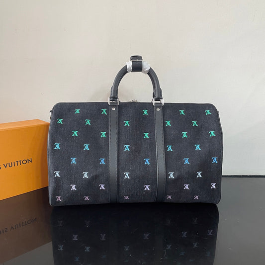 Luxury Black Travel Duffel Bag with Colorful LV Monogram for Stylish Weekend Getaways