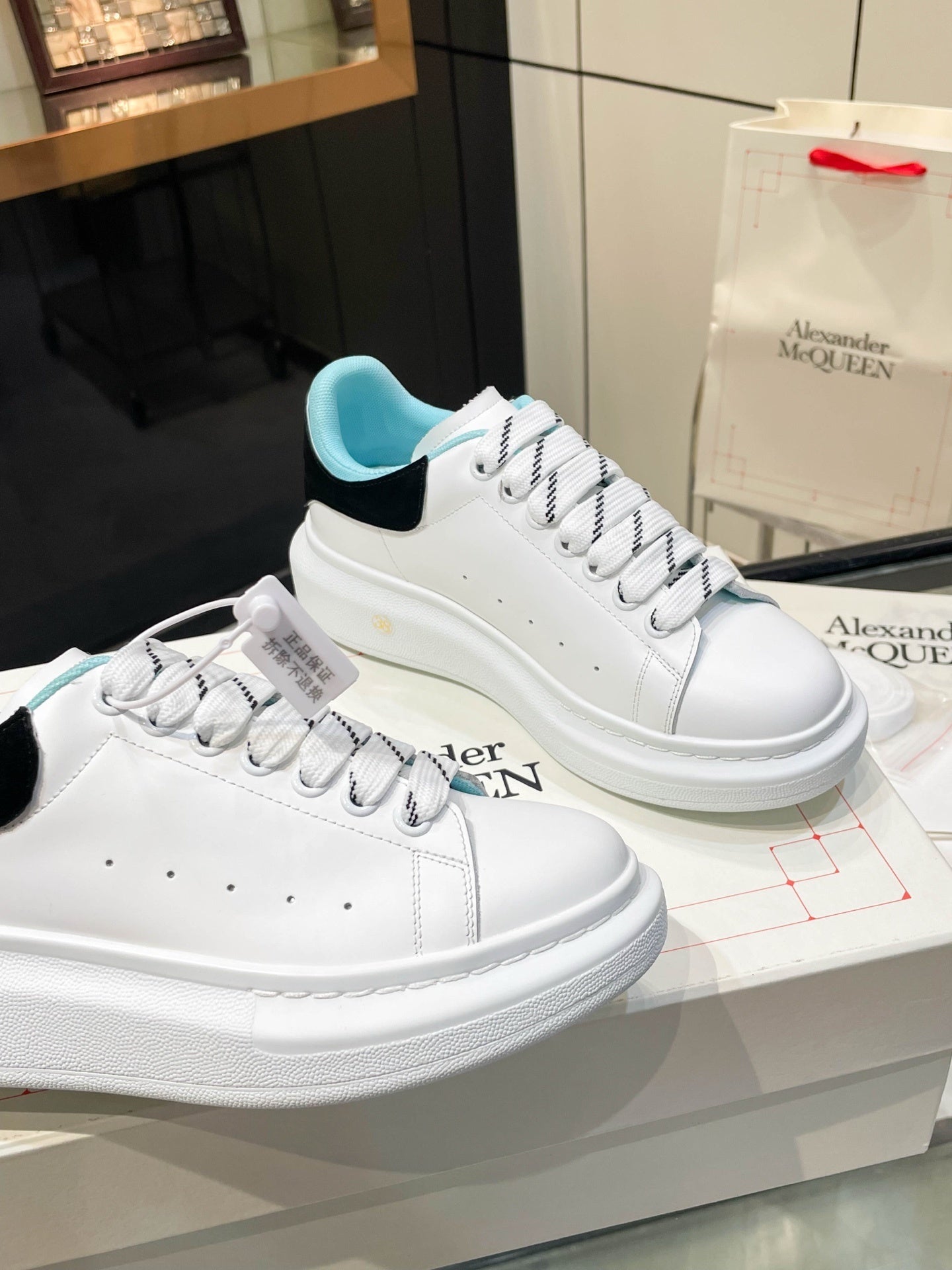 Alexander McQueen Unisex Oversized Sneakers With Blue And Black Accents